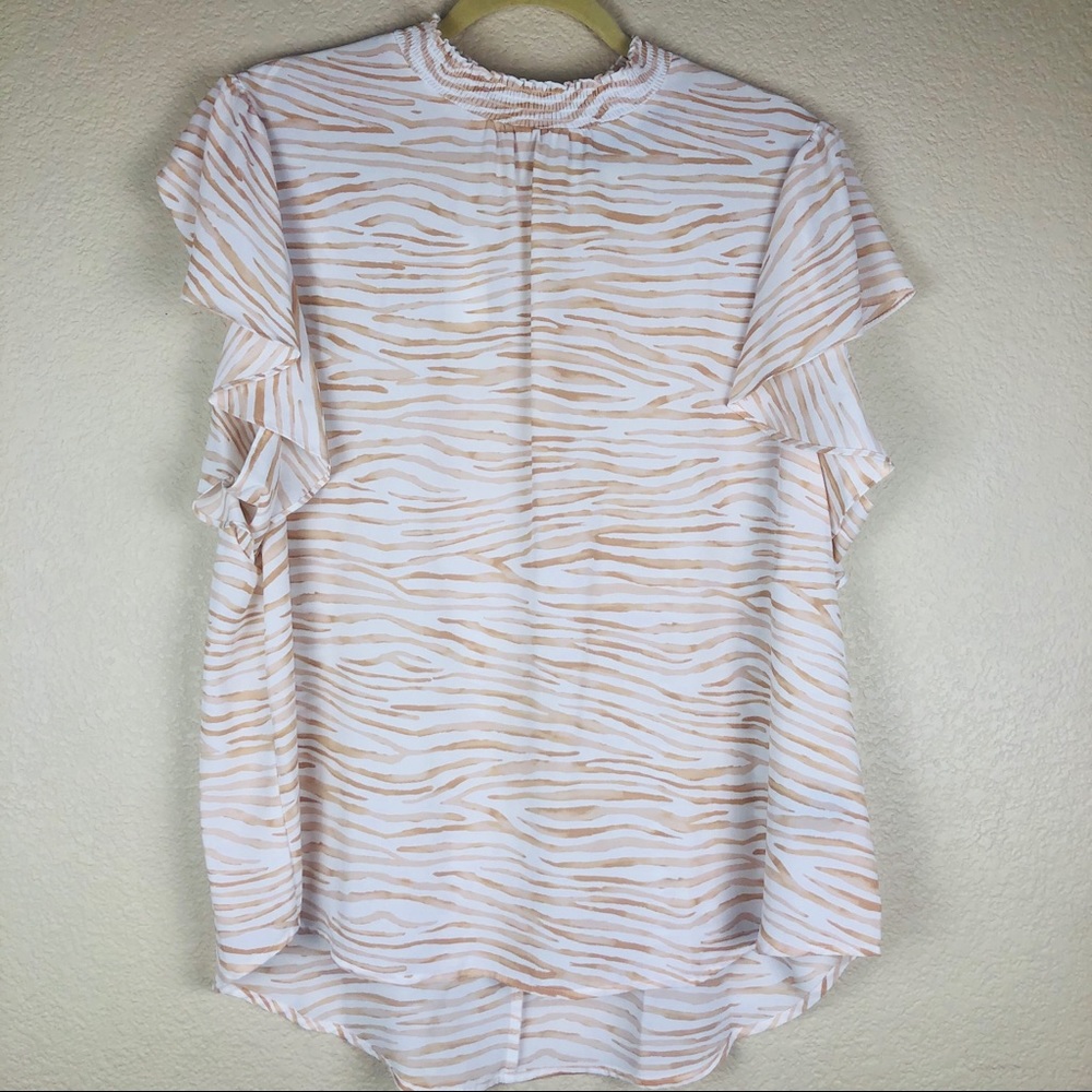 White blouse with tan zebra print